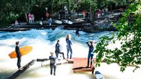 Unleash Your Inner Surfer: Conquer the Eisbach Ice River Waves in Munich
