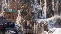 Kashmir's Coldest Winter Transforms Drang Waterfall into a Frozen Marvel near Gulmarg