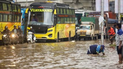 Heavy Rainfall in Bengaluru Leads to School Closures and Traffic Disruptions