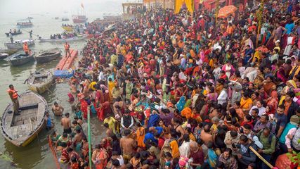 Millions Take Holy Dip in Ganges on Kartik Purnima