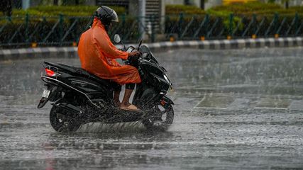 IMD Predicts Heavy Rainfall in Kerala, Bengaluru Grapples with Waterlogged Roads