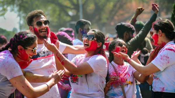 playing holi youth