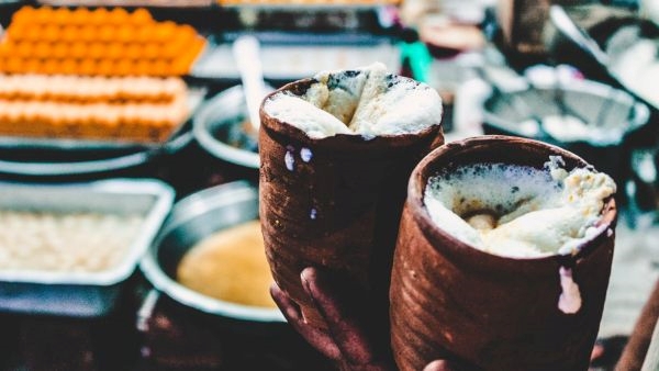 2. Lassi: Quench your thirst with a refreshing glass of Lassi, a traditional yogurt-based drink. Served in earthen pots, this creamy and sweet beverage is the perfect companion to beat the heat while exploring the city.