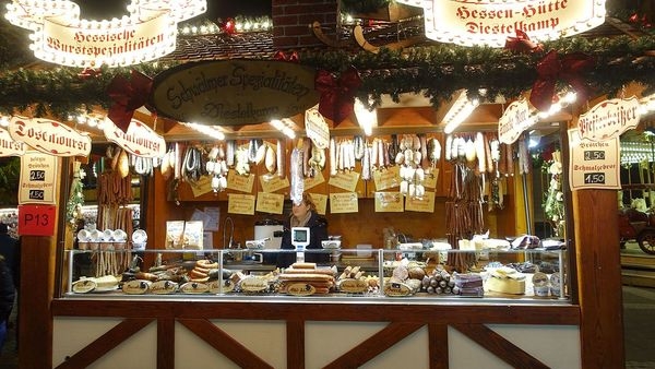 A bustling street filled with eateries in Frankfurt