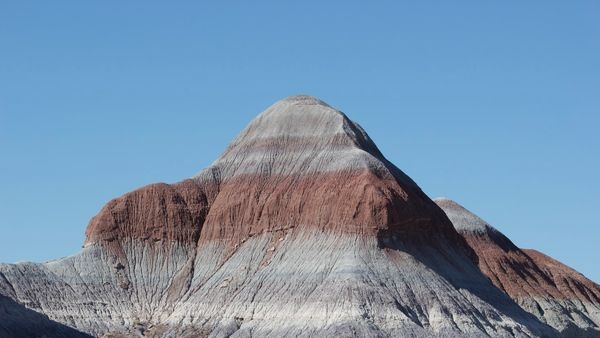 Vibrant hues across layered rock formations in Painted Desert Vibrant hues across layered rock formations in Painted Desert