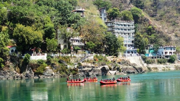 Yoga by the Ganges River in Rishikesh Yoga by the Ganges River in Rishikesh