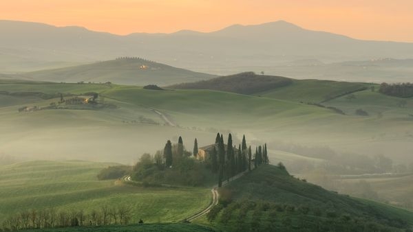 A beautiful view of the scenic Tuscan hills and vineyards