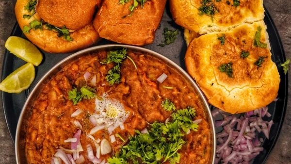 A busy street food stall in Mumbai offering variety of dishes A busy street food stall in Mumbai offering variety of dishes