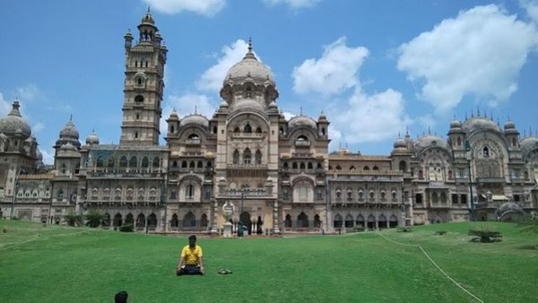 Alt_text: Night view of Illuminated Laxmi Vilas Palace Alt_text: Night view of Illuminated Laxmi Vilas Palace