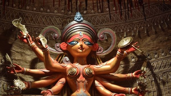 Beautifully adorned idol of Goddess Durga during Sthapana ceremony Beautifully adorned idol of Goddess Durga during Sthapana ceremony