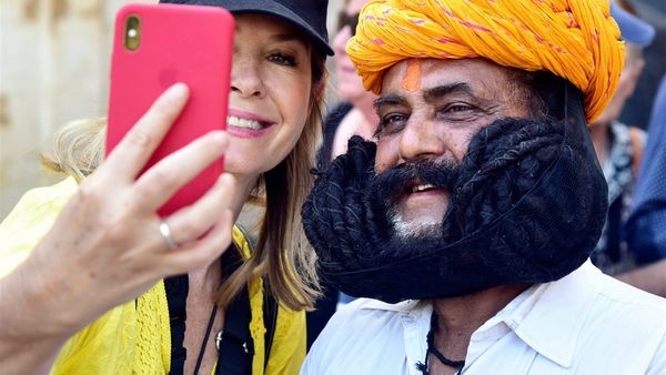Germans smiling as they learn Hindi phrases Germans smiling as they learn Hindi phrases
