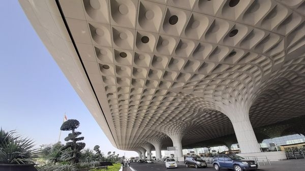 iconic Terminal 2 at Chhatrapati Shivaji Maharaj International Airport in Mumbai showing the dedicated art walk, retail shops and restaurants iconic Terminal 2 at Chhatrapati Shivaji Maharaj International Airport in Mumbai showing the dedicated art walk, retail shops and restaurants