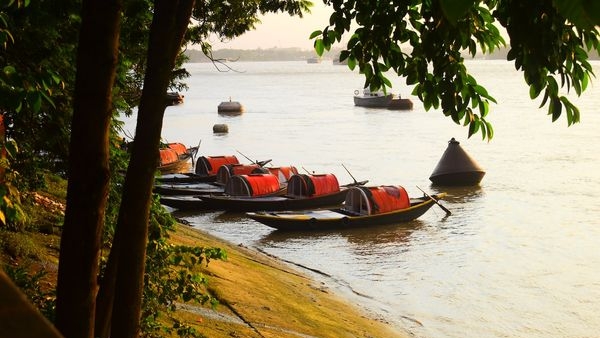 Image capturing a picturesque evening view over the Hooghly river in Kolkata Image capturing a picturesque evening view over the Hooghly river in Kolkata