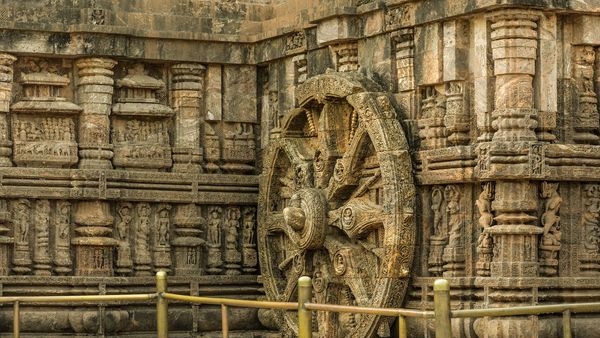 Image of Konark Temple with crowd of tourists enjoying the sunny winter day Image of Konark Temple with crowd of tourists enjoying the sunny winter day