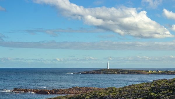 Splendid view of Cape Leeuwin Lighthouse at the converging point of the Indian and the Southern Oceans Splendid view of Cape Leeuwin Lighthouse at the converging point of the Indian and the Southern Oceans