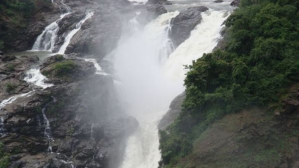 Alt Text: Scenic drive along the road leading to Sivasamudram Falls. Alt Text: Scenic drive along the road leading to Sivasamudram Falls.