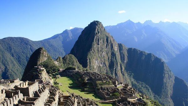 A panoramic view of the ancient city of Machu Picchu nestled in the Peruvian Andes