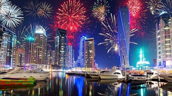 Alt text: A luxury dinner cruise sailing in Dubai Marina during night Alt text: A luxury dinner cruise sailing in Dubai Marina during night