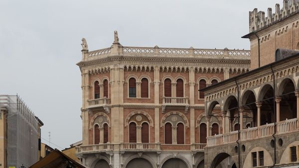 An atmospheric view of the vibrant Piazza delle Erbe, the heart of Verona