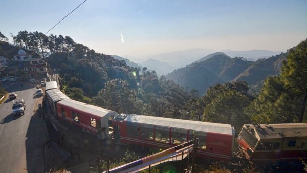 Image alt text: Picture of the heritage coach of the Kalka-Shimla Toy Train, filled with excited passengers enjoying the slow-paced, immersive travel. Image alt text: Picture of the heritage coach of the Kalka-Shimla Toy Train, filled with excited passengers enjoying the slow-paced, immersive travel.