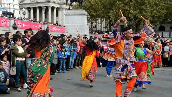 Image of Sadiq Khan, Mayor of London, applauding the Diwali celebration as a symbolic victory of light over darkness