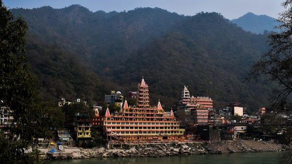 Rafter amidst the adrenaline-filled rapids of the Ganges in Rishikesh