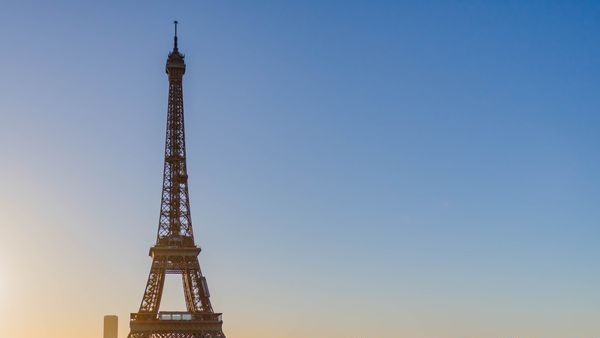 The Eiffel Tower surrounded by colorful Autumn leaves