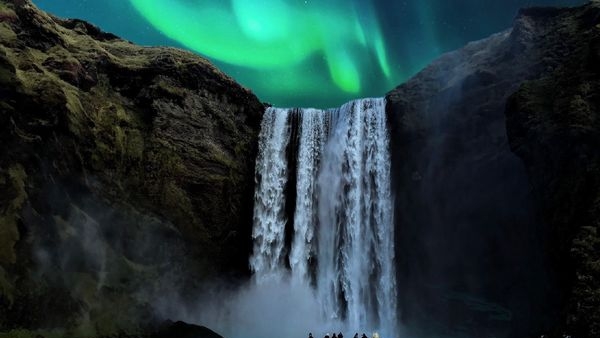The stunning Aurora Borealis illuminating the icy Iceland sky