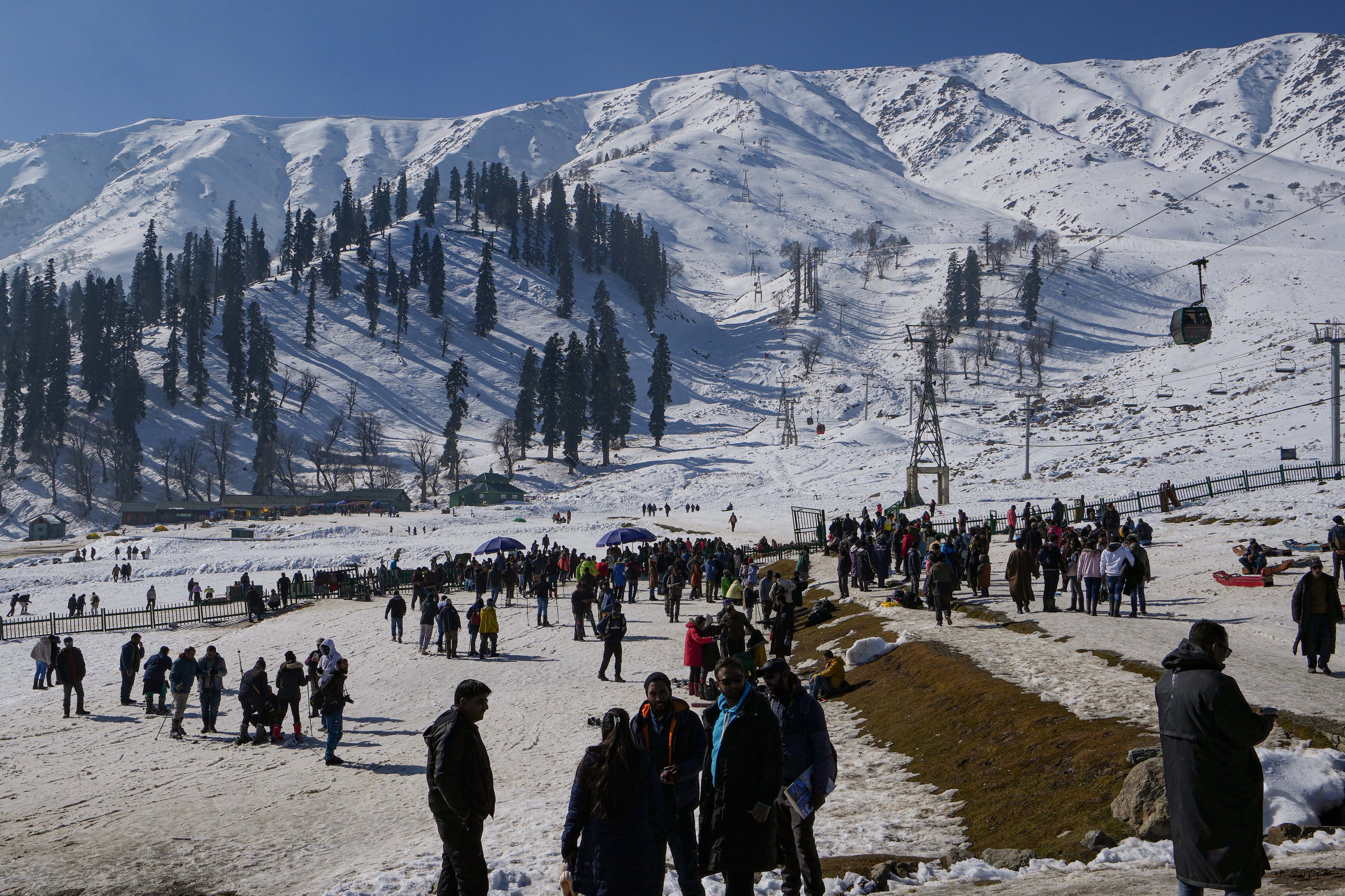Stunning Pics of Tourists at Gulmarg Ski Resort after snowfall